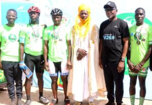 ‎L-R: Bamidele Adeleye, Managing Director, BrandEscort Communications; Jacob Ishaku, Silver Medal Winner, Professional Category; Isa Momoh, Gold Metal Winner; Alhaji Sanusi Bello, Barwan Kano, repressing, Mallam Muhammadu Sunusi II, the Emir of Kano; Mr Ali Ali, Area Business Executive Northwest 1, Union Bank of Nigeria Plc and Joel Berry, Bronze Medal Winner at the Cycling Kano event in Kano on Saturday December 20, 2025.