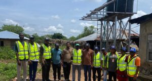 AKA Foundation Volunteers Inspect Ongoing Solar-Powered Streetlights Installation in Olode Adetoun Village
